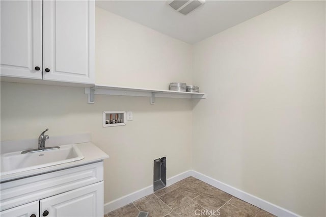 30316 Slate St, Murrieta, CA 92563 - washroom featuring washer hookup, cabinet space, and electric dryer hookup