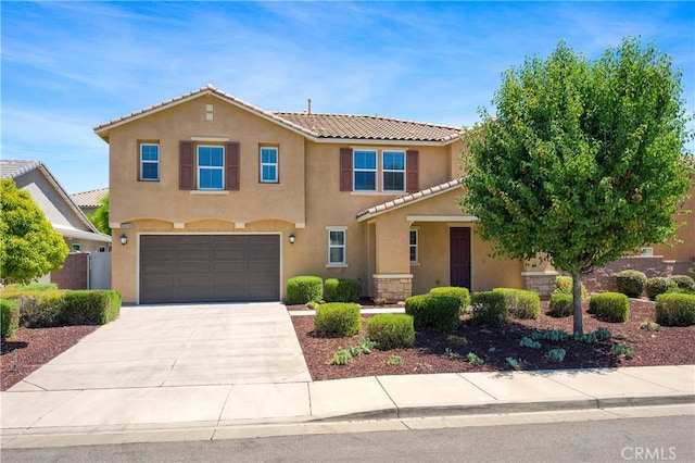 30316 Slate St, Murrieta, CA 92563 - view of front of house with an attached garage, stucco siding, concrete driveway, and a tiled roof