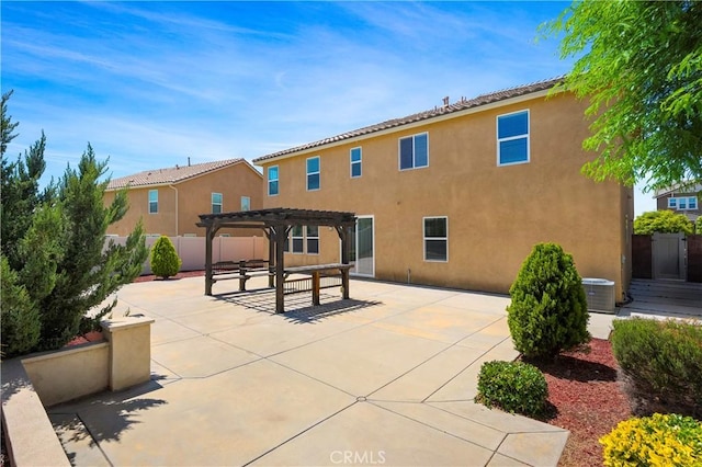30316 Slate St, Murrieta, CA 92563 - back of property featuring a pergola, a patio area, and stucco siding