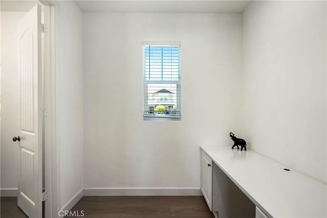 30316 Slate St, Murrieta, CA 92563 - laundry room with baseboards and dark wood-type flooring