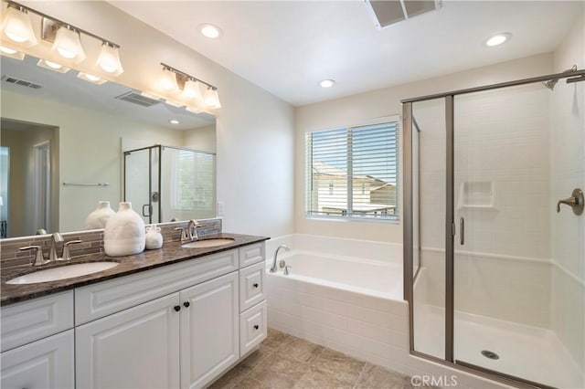 30316 Slate St, Murrieta, CA 92563 - full bathroom with a stall shower, double vanity, a garden tub, tile patterned floors, and recessed lighting