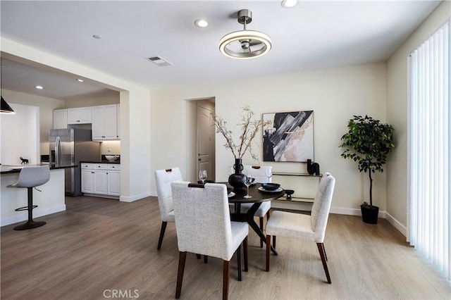 30316 Slate St, Murrieta, CA 92563 - dining space with light wood-type flooring and recessed lighting