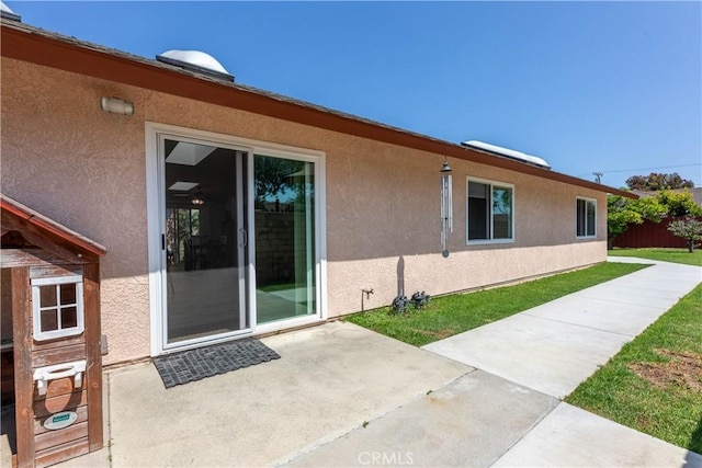 10262 Circulo De Juarez, Fountain Valley, CA 92708 - view of home's exterior with stucco siding and a patio area