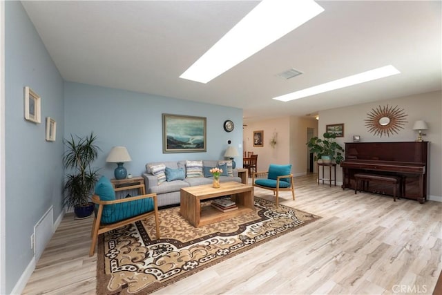 10262 Circulo De Juarez, Fountain Valley, CA 92708 - living room with a skylight and wood finished floors