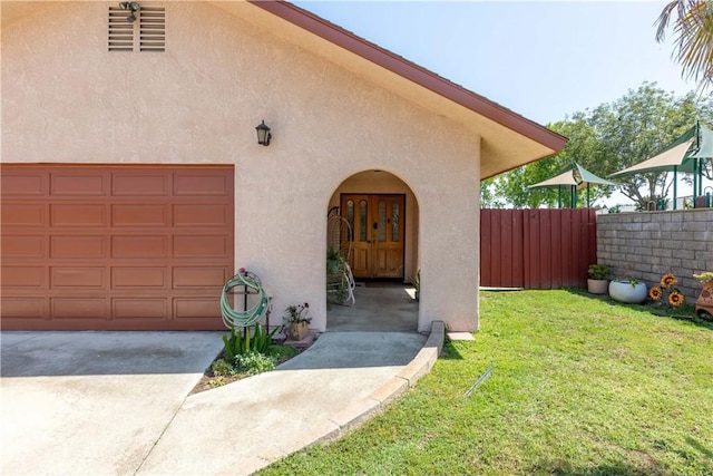 10262 Circulo De Juarez, Fountain Valley, CA 92708 - doorway to property featuring stucco siding and a garage
