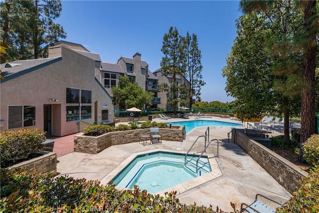 1441 Brett Pl Unit 148, San Pedro, CA 90732 - community pool featuring a hot tub and a patio