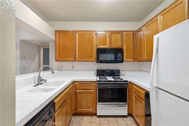 1441 Brett Pl Unit 148, San Pedro, CA 90732 - kitchen featuring white appliances, tile counters, light tile patterned floors, and brown cabinetry