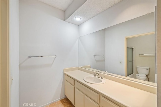 1441 Brett Pl Unit 148, San Pedro, CA 90732 - bathroom with vanity, tile patterned floors, and a textured ceiling