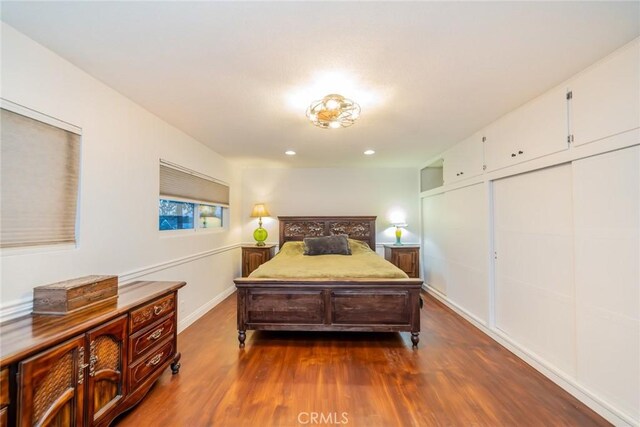 533 Via Vista Dr, Redlands, CA 92373 - bedroom featuring dark wood-style floors and a closet