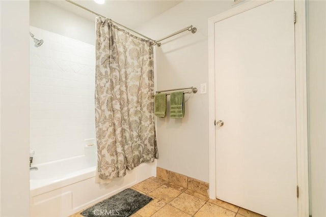 533 Via Vista Dr, Redlands, CA 92373 - full bath featuring shower / bathtub combination with curtain and stone tile flooring