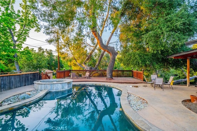533 Via Vista Dr, Redlands, CA 92373 - view of swimming pool with a deck, a fenced backyard, and a pool with connected hot tub