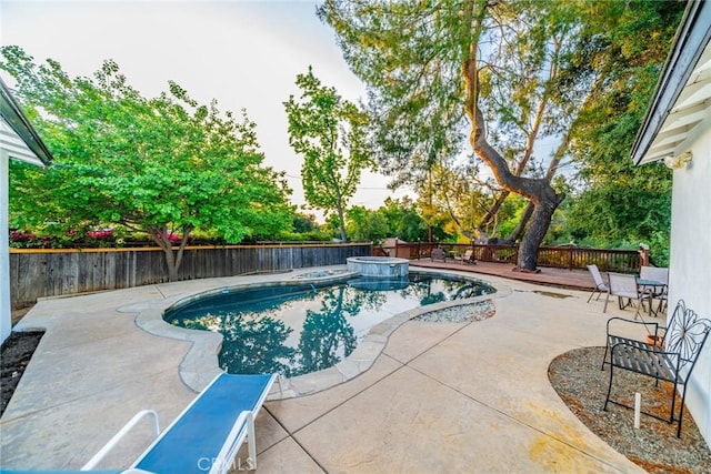 533 Via Vista Dr, Redlands, CA 92373 - view of pool with a fenced backyard, a patio area, and a pool with connected hot tub