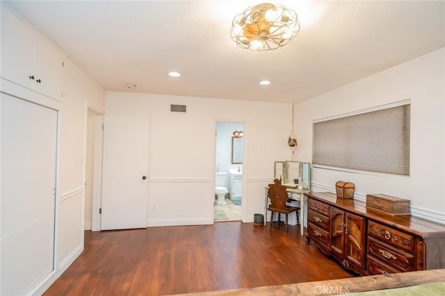 533 Via Vista Dr, Redlands, CA 92373 - bedroom with wood finished floors, a desk, recessed lighting, connected bathroom, and washer / clothes dryer