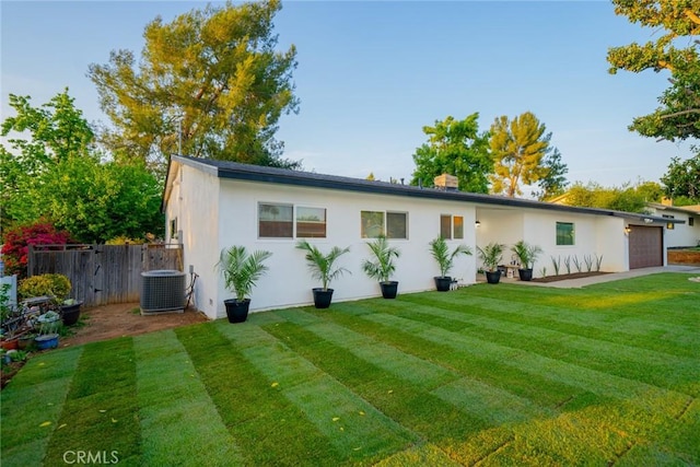 533 Via Vista Dr, Redlands, CA 92373 - view of front of house with an attached garage and stucco siding