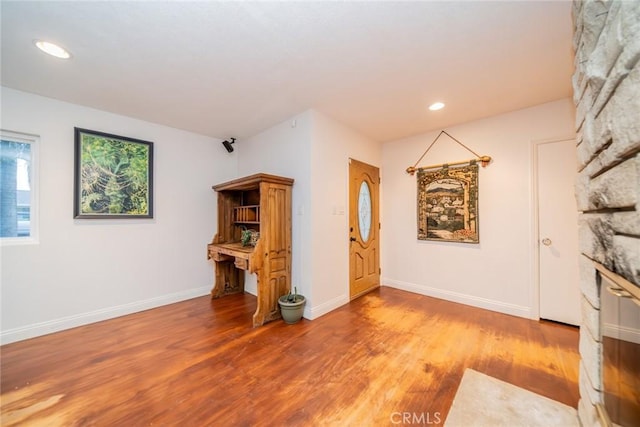 533 Via Vista Dr, Redlands, CA 92373 - unfurnished living room with wood finished floors and recessed lighting