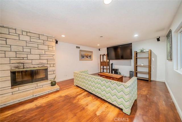 533 Via Vista Dr, Redlands, CA 92373 - living area featuring recessed lighting, a stone fireplace, and wood finished floors
