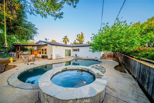 533 Via Vista Dr, Redlands, CA 92373 - view of swimming pool with a patio, a fenced backyard, and a pool with connected hot tub