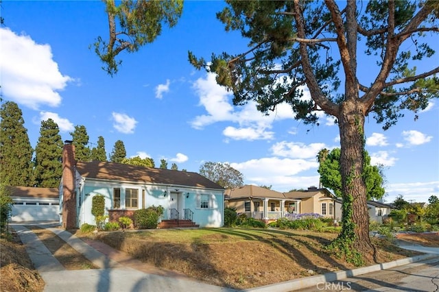 5516 Palm Ave, Whittier, CA 90601 - view of front facade with a chimney and brick siding