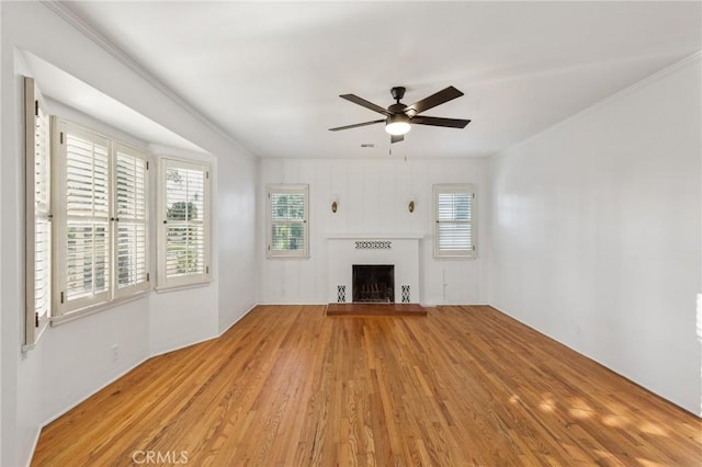 5516 Palm Ave, Whittier, CA 90601 - unfurnished living room with light wood-type flooring, ceiling fan, and a fireplace with raised hearth