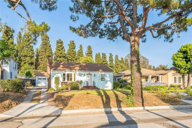 5516 Palm Ave, Whittier, CA 90601 - ranch-style home with driveway and a chimney