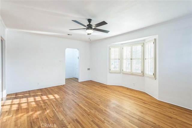 5516 Palm Ave, Whittier, CA 90601 - unfurnished room with arched walkways, a ceiling fan, light wood finished floors, and ornamental molding