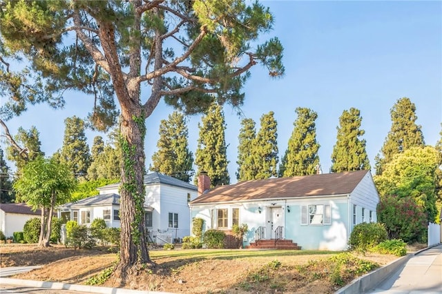 5516 Palm Ave, Whittier, CA 90601 - ranch-style home featuring stucco siding and a chimney