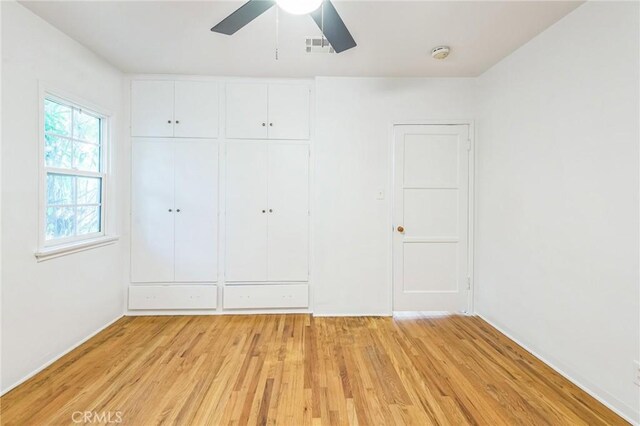 5516 Palm Ave, Whittier, CA 90601 - unfurnished bedroom with light wood-type flooring, a closet, and a ceiling fan