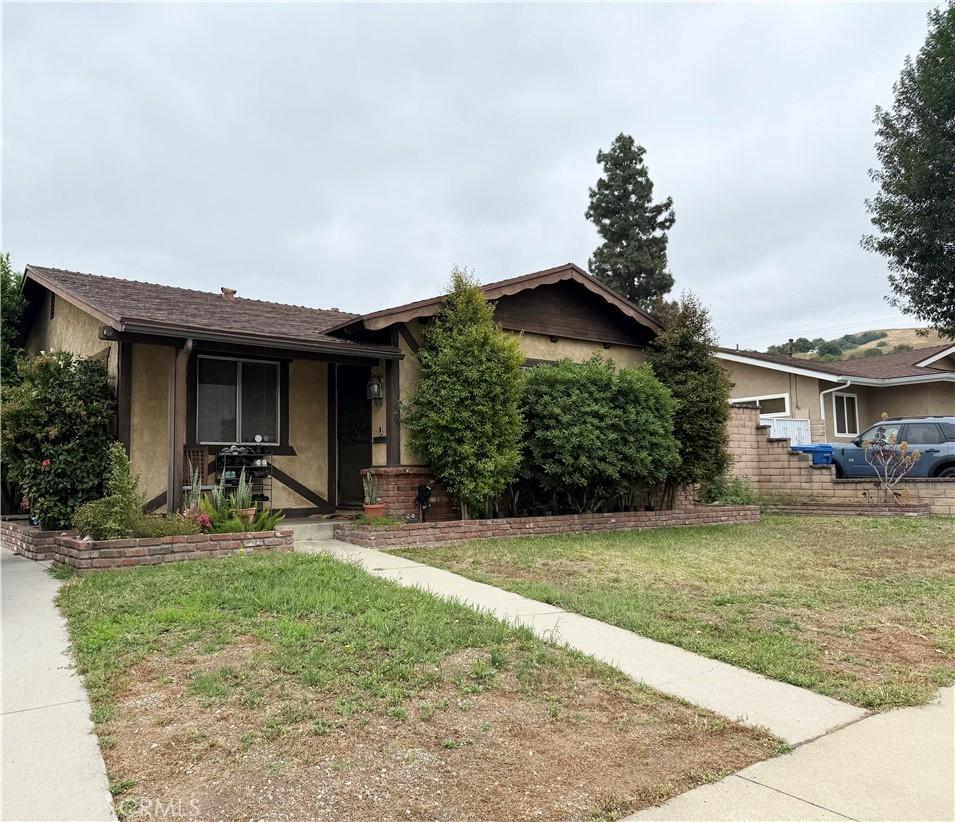 18708 Fieldbrook St, Rowland Heights, CA 91748 - ranch-style home featuring stucco siding and a front lawn