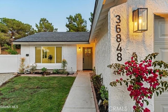 36848 Apache Plume Dr, Palmdale, CA 93550 - property entrance with a shingled roof and stucco siding