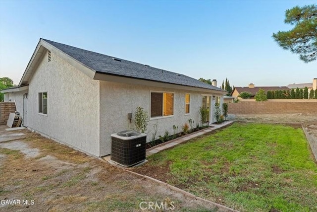 36848 Apache Plume Dr, Palmdale, CA 93550 - view of property exterior featuring stucco siding and a cooling unit