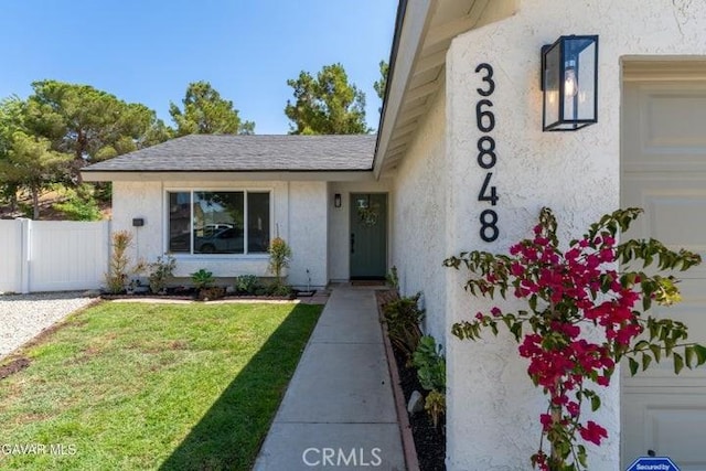 36848 Apache Plume Dr, Palmdale, CA 93550 - entrance to property featuring stucco siding and a garage