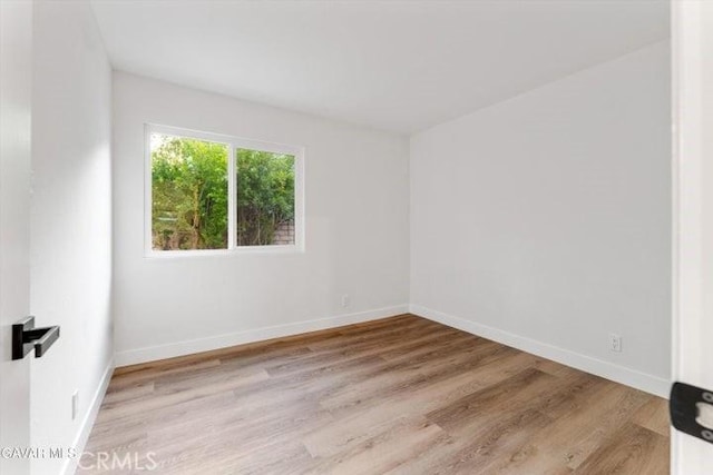 36848 Apache Plume Dr, Palmdale, CA 93550 - spare room featuring wood finished floors and baseboards