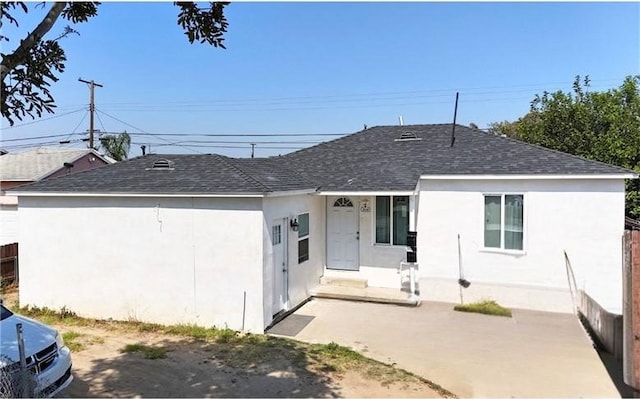 316 N Maie Ave, Compton, CA 90220 - rear view of property featuring stucco siding and roof with shingles
