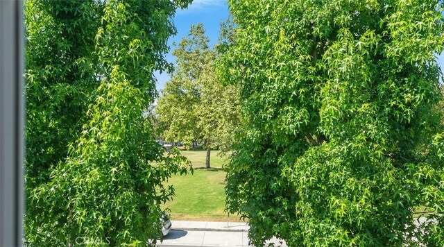 2303 Paseo Circulo, Tustin, CA 92782 - view of property's community featuring a lawn