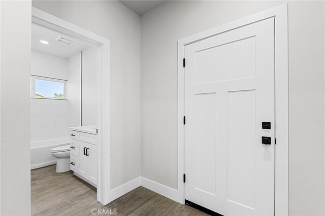 6388 Oak Rd, Paradise, CA 95969 - corridor with wood finished floors and baseboards