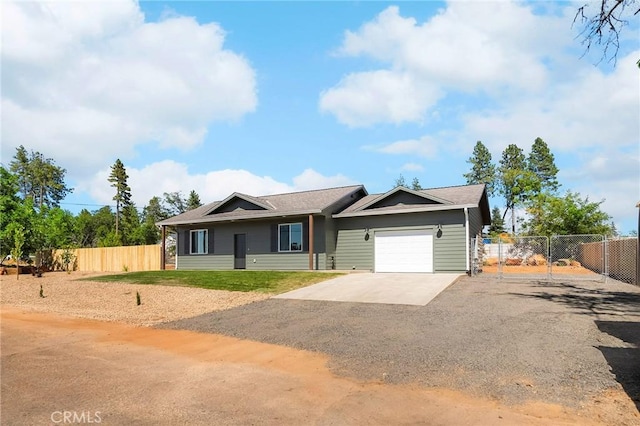 6388 Oak Rd, Paradise, CA 95969 - ranch-style house featuring a garage and driveway