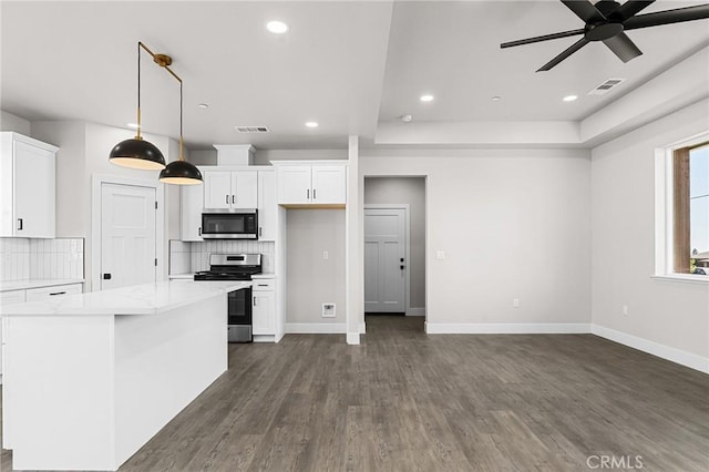 6388 Oak Rd, Paradise, CA 95969 - kitchen featuring appliances with stainless steel finishes, tasteful backsplash, ceiling fan, white cabinetry, and recessed lighting
