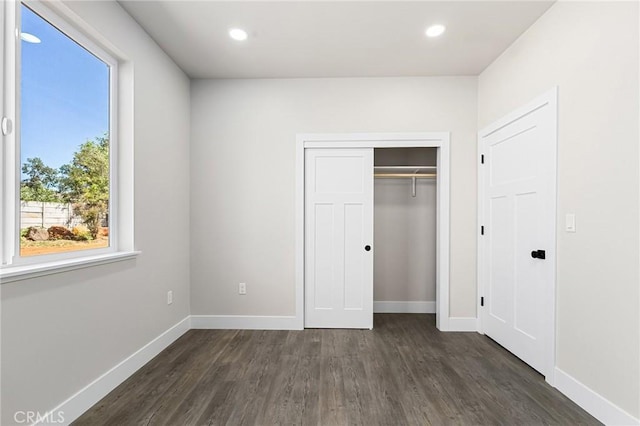 6388 Oak Rd, Paradise, CA 95969 - unfurnished bedroom with dark wood-style flooring, recessed lighting, and a closet