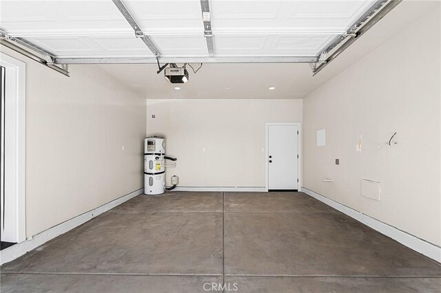 6388 Oak Rd, Paradise, CA 95969 - garage with a garage door opener and a central vacuum unit