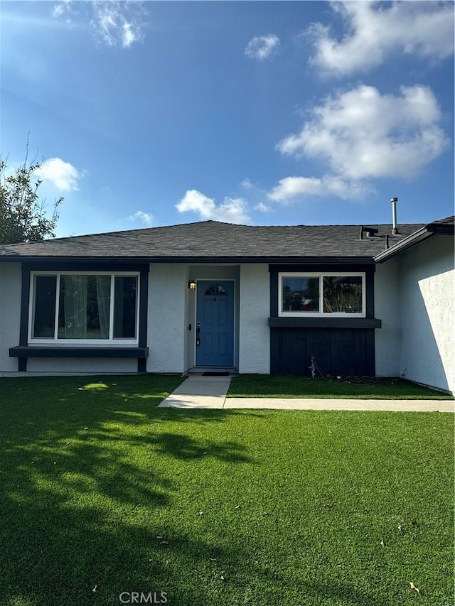 3195 Camarillo Ave, Oceanside, CA 92056 - ranch-style house with stucco siding, a front yard, and roof with shingles