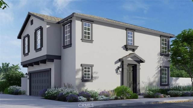 358 Fowler Way, Rialto, CA 92377 - view of front facade featuring stucco siding and a garage