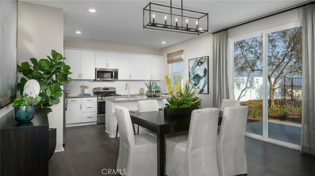 358 Fowler Way, Rialto, CA 92377 - dining room featuring plenty of natural light, dark wood-style floors, and recessed lighting