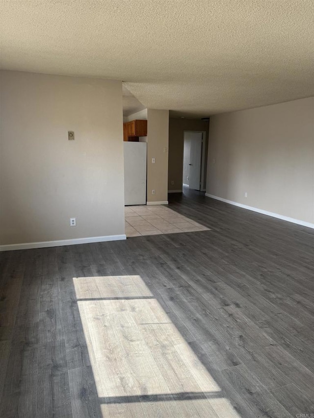 384 I St, Chula Vista, CA 91910 - unfurnished room featuring light wood finished floors and a textured ceiling