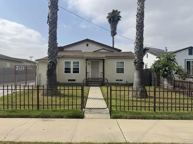 384 I St, Chula Vista, CA 91910 - bungalow with stucco siding, a fenced front yard, and a gate