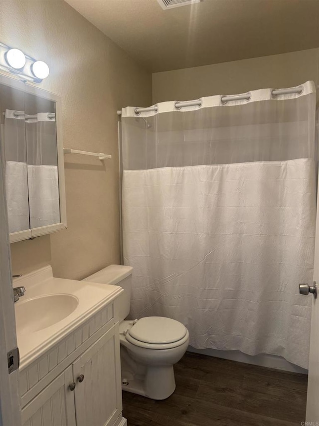 384 I St, Chula Vista, CA 91910 - full bath with wood finished floors, vanity, and curtained shower