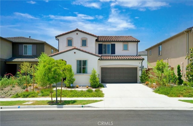 2239 Melogold Way, Corona, CA 92883 - mediterranean / spanish-style home featuring a tile roof, a garage, stucco siding, and driveway