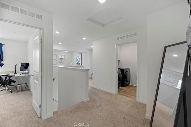 2239 Melogold Way, Corona, CA 92883 - corridor featuring washing machine and clothes dryer, light colored carpet, an upstairs landing, attic access, and recessed lighting