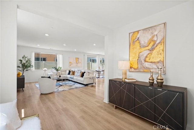 2239 Melogold Way, Corona, CA 92883 - living area featuring light wood-type flooring and recessed lighting