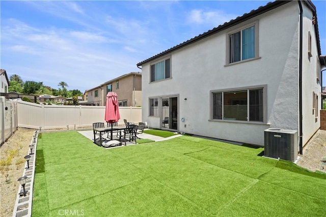 2239 Melogold Way, Corona, CA 92883 - back of property featuring a fenced backyard, stucco siding, and a patio