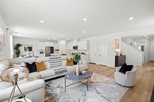 2239 Melogold Way, Corona, CA 92883 - living area with light wood-type flooring and recessed lighting